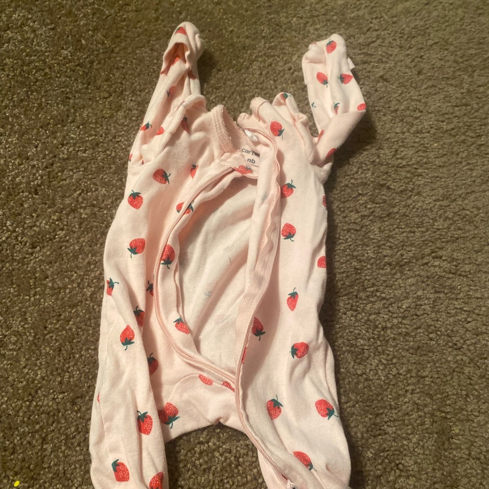 Carter’s NB Pink Zip Up Footed Sleeper with strawberries.